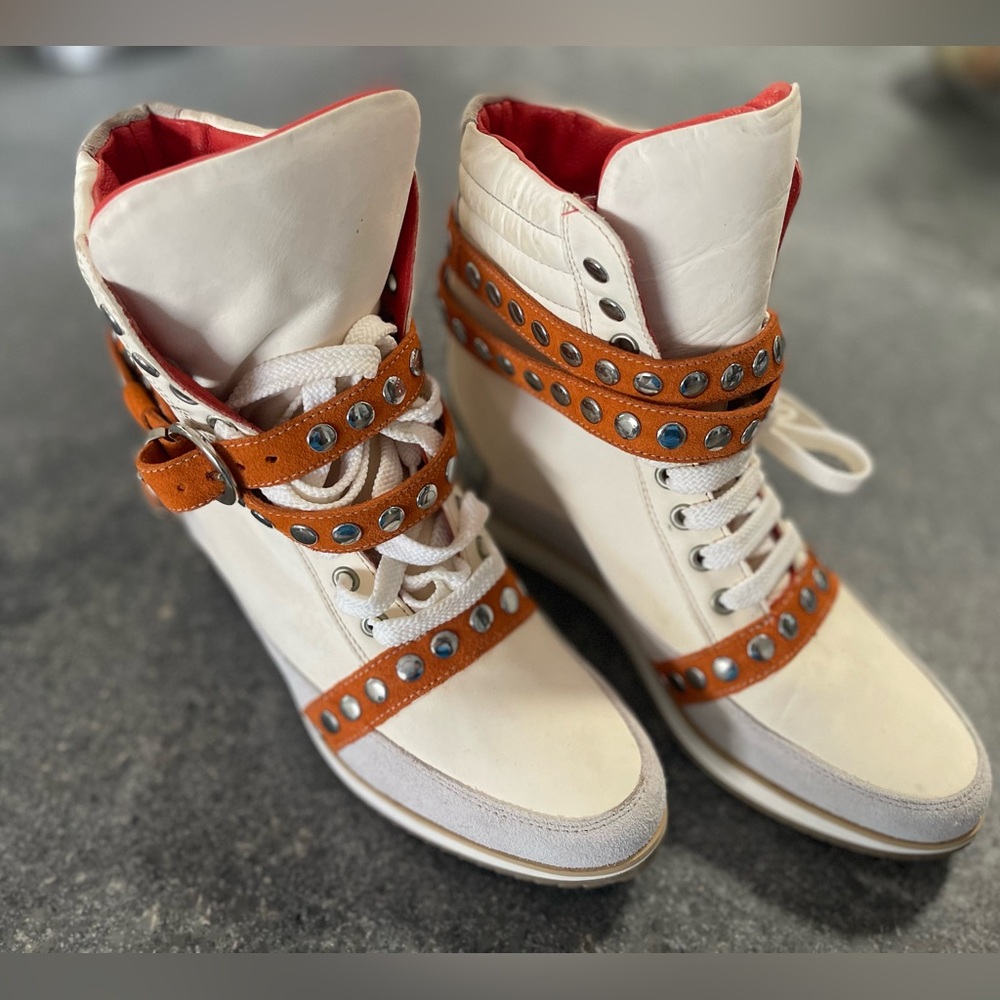 Wedge high top sneakers size 8 (Italian 39) in crème with studded orange straps.
